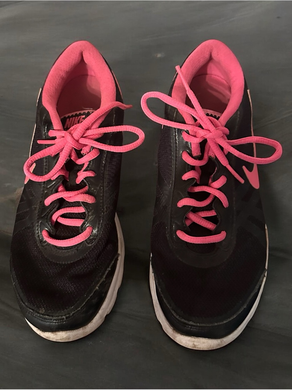 Nike Women’s Black Sneakers with Pink Accents